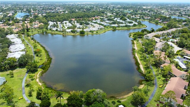 3052 Kings Lake Blvd Unit 7554, Naples, FL 34112 - aerial overview of property's location featuring nearby suburban area and a nearby body of water