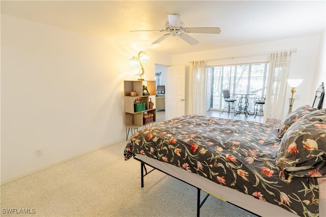 3052 Kings Lake Blvd Unit 7554, Naples, FL 34112 - bedroom with carpet floors and ceiling fan
