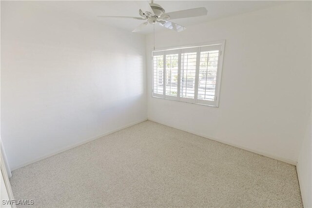 3052 Kings Lake Blvd Unit 7554, Naples, FL 34112 - carpeted spare room featuring a ceiling fan