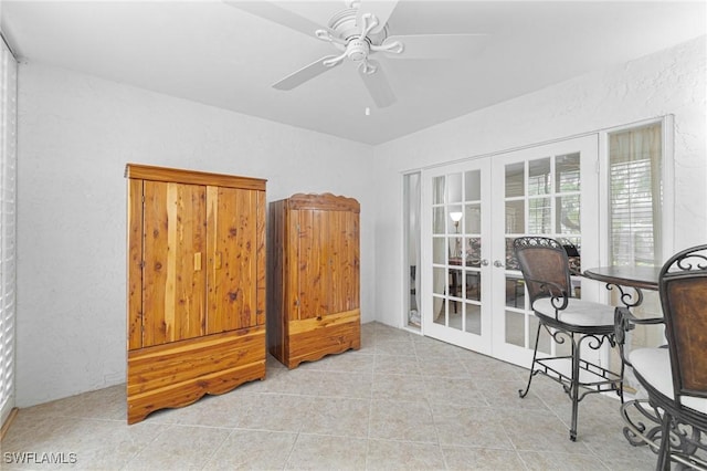 3052 Kings Lake Blvd Unit 7554, Naples, FL 34112 - office with french doors, a textured wall, ceiling fan, and tile patterned flooring