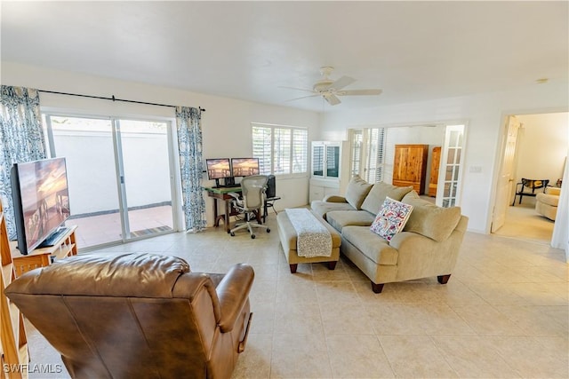 3052 Kings Lake Blvd Unit 7554, Naples, FL 34112 - living area featuring light tile patterned floors, ceiling fan, and an office area