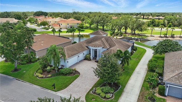 12006 Cypress Links Dr, Fort Myers, FL 33913 - aerial perspective of suburban area with a large body of water