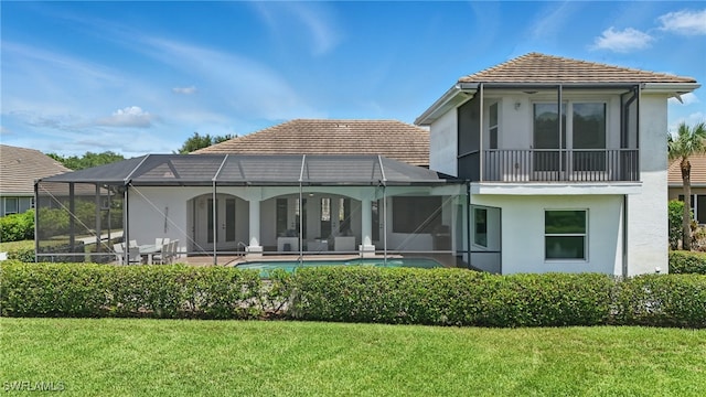 12006 Cypress Links Dr, Fort Myers, FL 33913 - rear view of house featuring stucco siding, a lawn, an outdoor pool, glass enclosure, and a patio