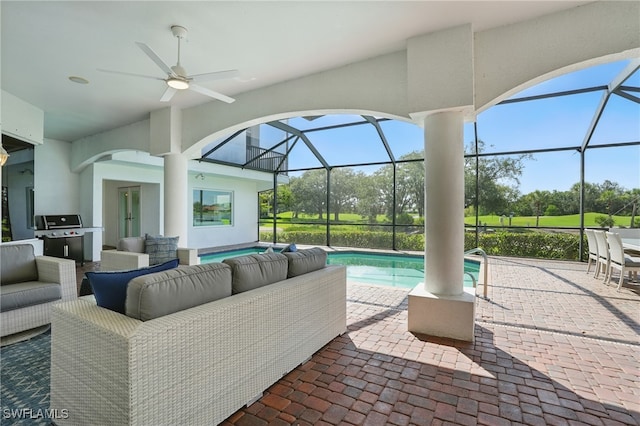 12006 Cypress Links Dr, Fort Myers, FL 33913 - view of patio with outdoor lounge area, area for grilling, ceiling fan, an outdoor pool, and a lanai