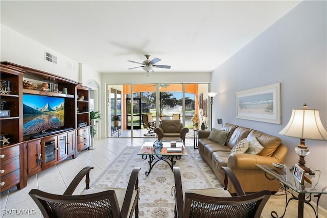 8565 Via Garibaldi Cir Unit 104, Estero, FL 33928 - living area featuring ceiling fan and light tile patterned floors