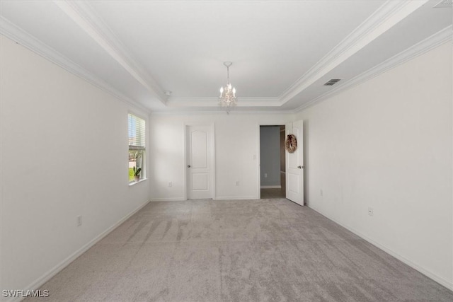 8959 Cascade Price Cir, North Fort Myers, FL 33917 - unfurnished room featuring a chandelier, light colored carpet, ornamental molding, and a raised ceiling