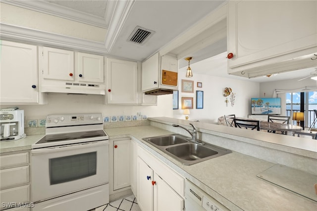 1901 Clifford St Unit 202, Fort Myers, FL 33901 - kitchen with white electric range oven, under cabinet range hood, light countertops, white cabinets, and ornamental molding