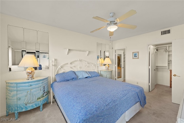 1901 Clifford St Unit 202, Fort Myers, FL 33901 - carpeted bedroom featuring a walk in closet, ceiling fan, and a closet