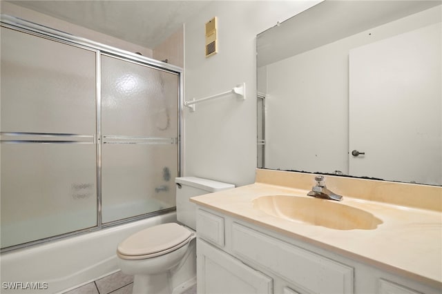 1901 Clifford St Unit 202, Fort Myers, FL 33901 - bathroom with vanity, combined bath / shower with glass door, and tile patterned flooring