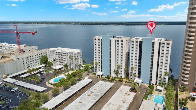 1901 Clifford St Unit 202, Fort Myers, FL 33901 - drone / aerial view of a pool and a nearby body of water