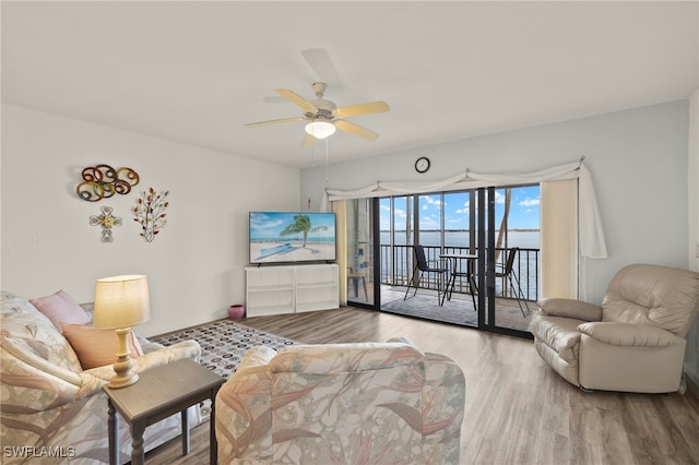 1901 Clifford St Unit 202, Fort Myers, FL 33901 - living room featuring a ceiling fan and wood finished floors