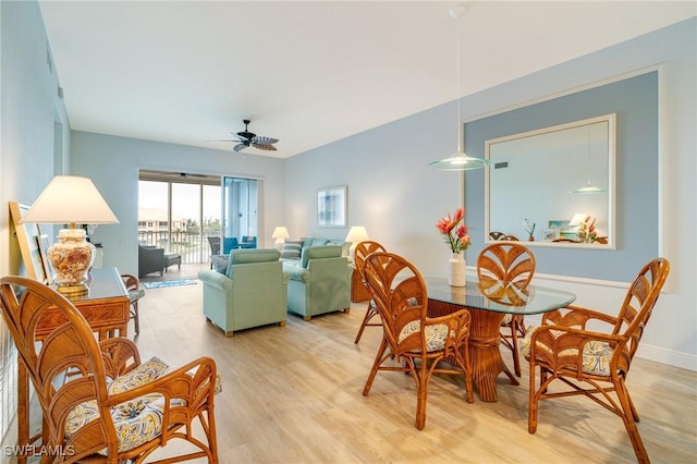 9190 Southmont Cv Unit 306, Fort Myers, FL 33908 - dining area with light wood-type flooring and a ceiling fan