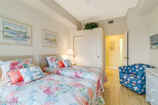 9190 Southmont Cv Unit 306, Fort Myers, FL 33908 - bedroom featuring light wood-style floors and a closet