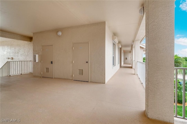 9190 Southmont Cv Unit 306, Fort Myers, FL 33908 - entrance to property with stucco siding and a balcony