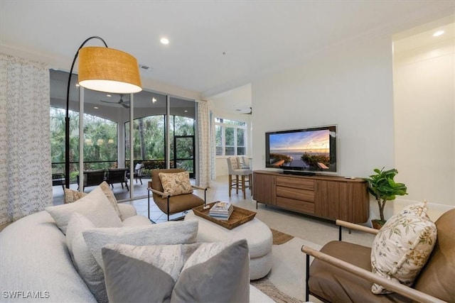 29120 Brendisi Way Unit 102, Naples, FL 34110 - living area with a wall of windows and recessed lighting