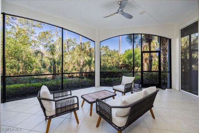 29120 Brendisi Way Unit 102, Naples, FL 34110 - sunroom featuring a ceiling fan, an outdoor hangout area, tile patterned flooring, and healthy amount of natural light