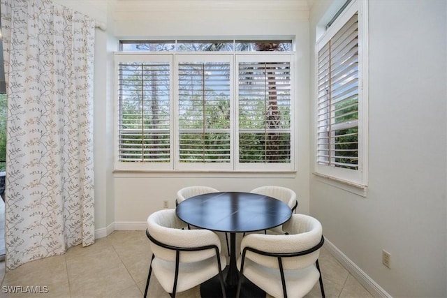 29120 Brendisi Way Unit 102, Naples, FL 34110 - dining room with plenty of natural light and light tile patterned floors