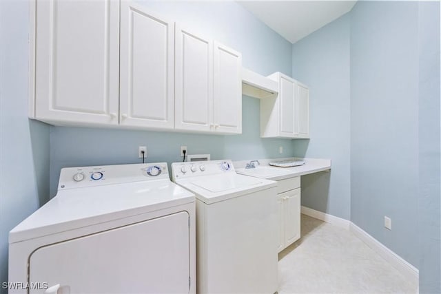 29120 Brendisi Way Unit 102, Naples, FL 34110 - laundry room featuring cabinet space and washer and dryer