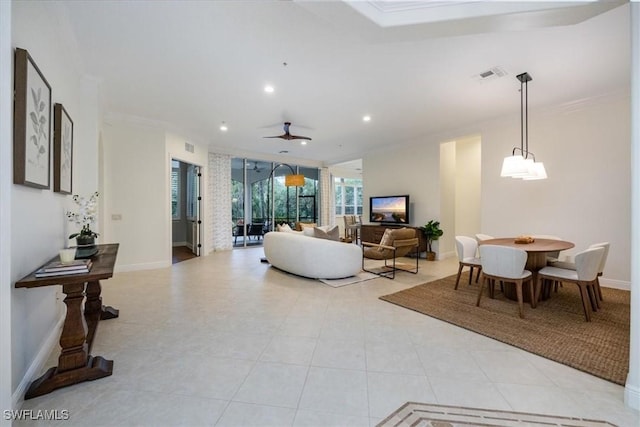29120 Brendisi Way Unit 102, Naples, FL 34110 - living room featuring ornamental molding, recessed lighting, and ceiling fan