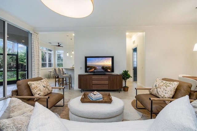 29120 Brendisi Way Unit 102, Naples, FL 34110 - living area featuring crown molding and light tile patterned floors