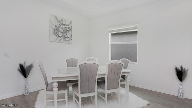 15898 Sugar Hill Dr, Punta Gorda, FL 33982 - dining space featuring wood finished floors