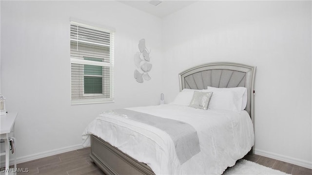 15898 Sugar Hill Dr, Punta Gorda, FL 33982 - bedroom featuring wood finished floors and baseboards
