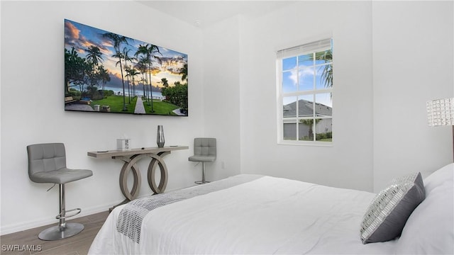 15898 Sugar Hill Dr, Punta Gorda, FL 33982 - bedroom with wood finished floors and baseboards