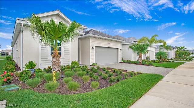 15898 Sugar Hill Dr, Punta Gorda, FL 33982 - single story home featuring decorative driveway, an attached garage, and stucco siding