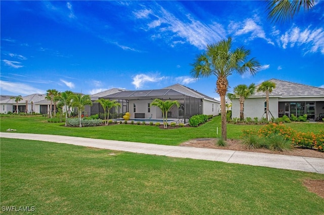 15898 Sugar Hill Dr, Punta Gorda, FL 33982 - ranch-style home featuring a front yard and glass enclosure