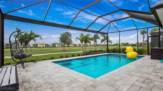 15898 Sugar Hill Dr, Punta Gorda, FL 33982 - outdoor pool featuring a lawn, a patio area, and a lanai