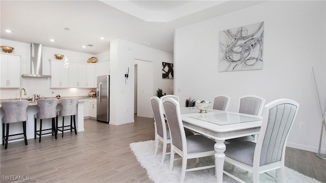 15898 Sugar Hill Dr, Punta Gorda, FL 33982 - dining space with light wood-type flooring and recessed lighting