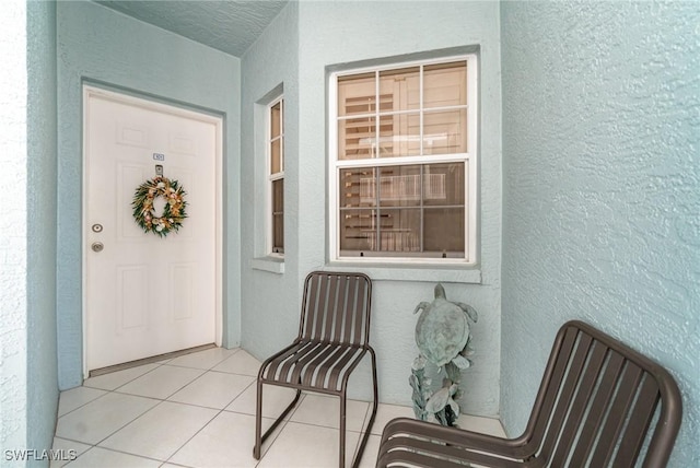 22724 Island Pines Way Unit 101, Fort Myers Beach, FL 33931 - view of exterior entry with stucco siding