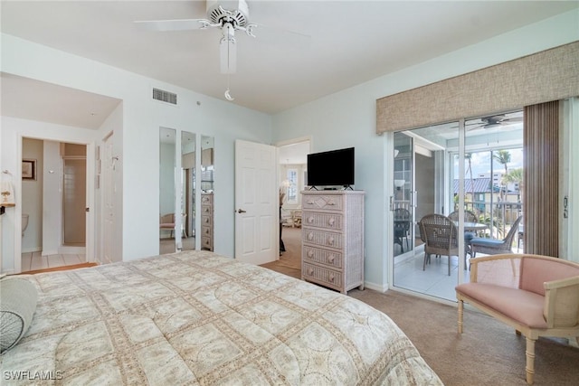22724 Island Pines Way Unit 101, Fort Myers Beach, FL 33931 - carpeted bedroom featuring access to outside and ceiling fan