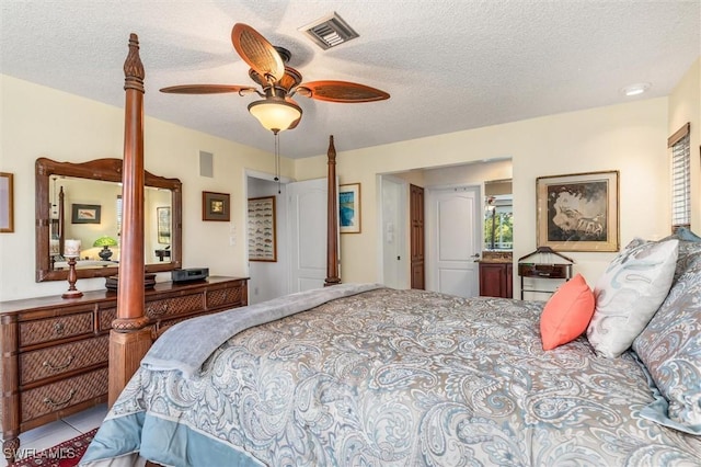 24398 Treasure Island Blvd, Punta Gorda, FL 33955 - bedroom with a textured ceiling and ceiling fan