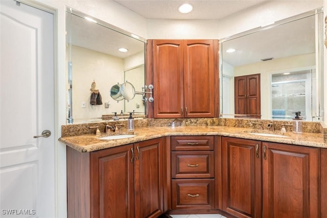 24398 Treasure Island Blvd, Punta Gorda, FL 33955 - full bath with double vanity, a stall shower, and recessed lighting