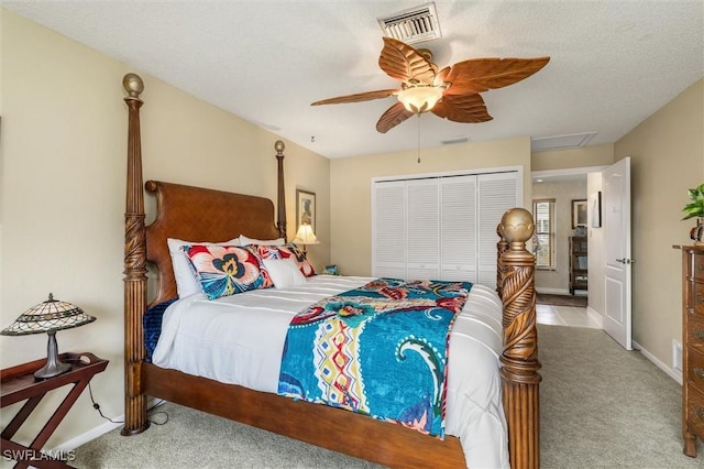 24398 Treasure Island Blvd, Punta Gorda, FL 33955 - bedroom with carpet flooring, a closet, and ceiling fan