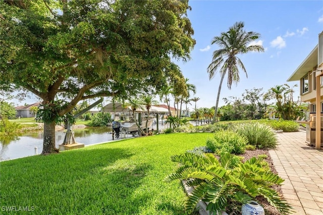 24398 Treasure Island Blvd, Punta Gorda, FL 33955 - view of green lawn with a water view