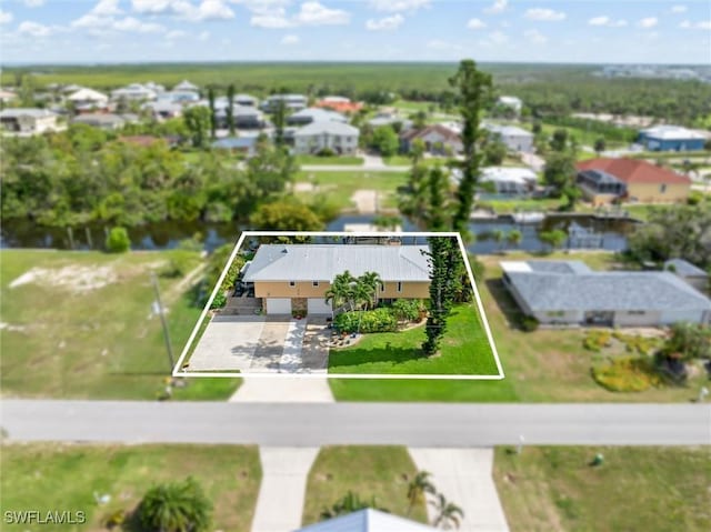 24398 Treasure Island Blvd, Punta Gorda, FL 33955 - aerial perspective of suburban area featuring property boundaries highlighted