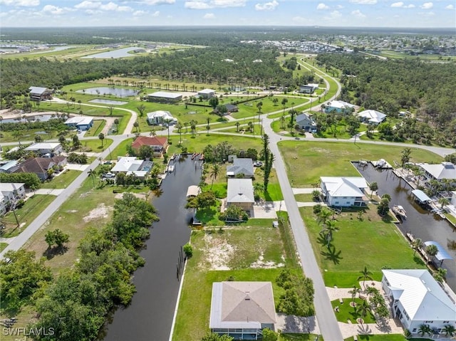 24398 Treasure Island Blvd, Punta Gorda, FL 33955 - aerial overview of property's location featuring a large body of water and nearby suburban area