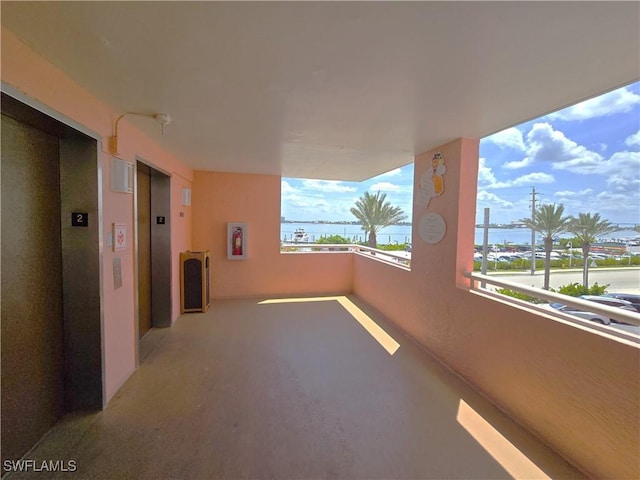 140 Estero Blvd Unit 2206, Fort Myers Beach, FL 33931 - balcony featuring elevator and a water view