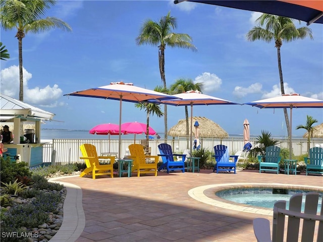 140 Estero Blvd Unit 2206, Fort Myers Beach, FL 33931 - view of swimming pool with a patio area and a water view