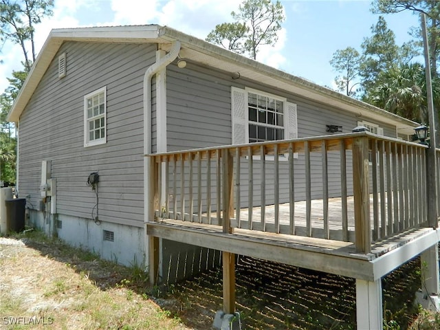 3611 8th Ave SE, Naples, FL 34117 - rear view of property featuring crawl space and a wooden deck