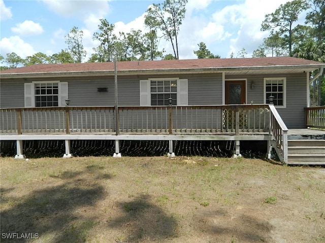 3611 8th Ave SE, Naples, FL 34117 - rear view of house with a deck