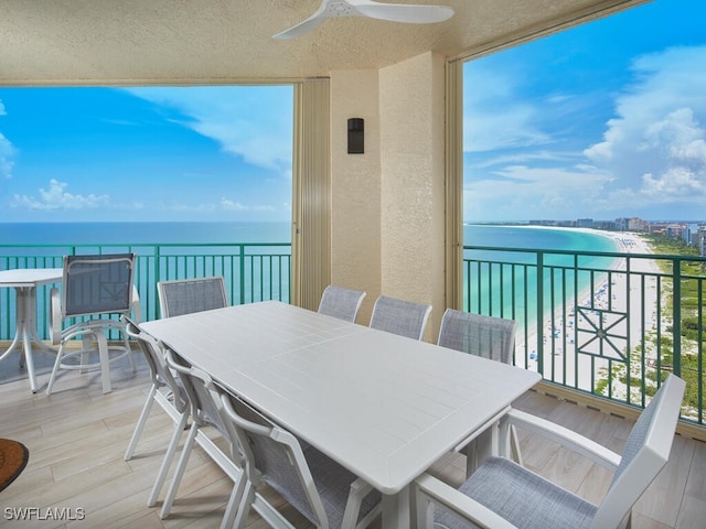 960 Cape Marco Dr Unit 1901, Marco Island, FL 34145 - balcony featuring a ceiling fan, a water view, and outdoor dining space