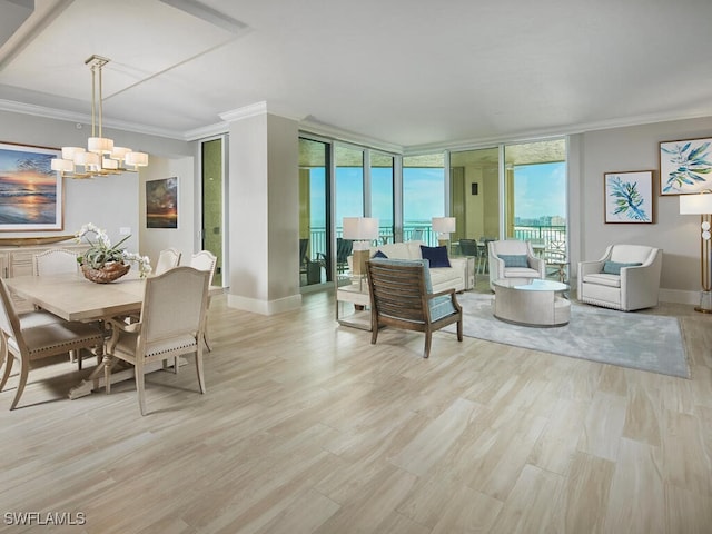 960 Cape Marco Dr Unit 1901, Marco Island, FL 34145 - living room featuring ornamental molding, a chandelier, light wood finished floors, and floor to ceiling windows