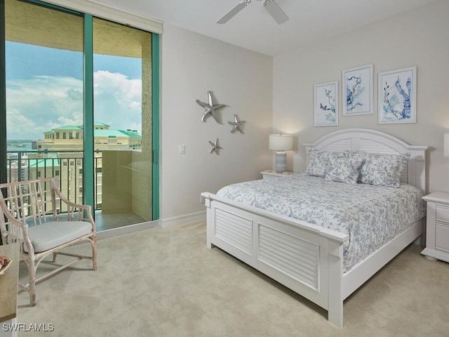 960 Cape Marco Dr Unit 1901, Marco Island, FL 34145 - bedroom with light carpet, access to outside, a wall of windows, and a ceiling fan