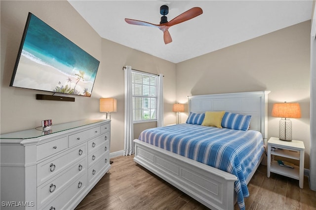 19671 Marino Lake Cir Unit 1602, Miromar Lakes, FL 33913 - bedroom featuring wood finished floors and ceiling fan
