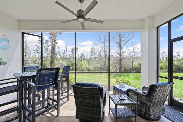 19671 Marino Lake Cir Unit 1602, Miromar Lakes, FL 33913 - sunroom with a ceiling fan, outdoor dining area, and an outdoor hangout area
