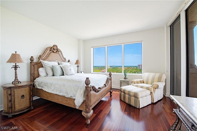 4875 Pelican Colony Blvd Unit 1801, Bonita Springs, FL 34134 - bedroom featuring dark wood-type flooring and baseboards