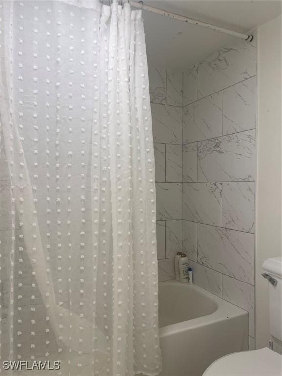 3706 Broadway Unit 27, Fort Myers, FL 33901 - full bath featuring toilet and shower / bath combo with shower curtain